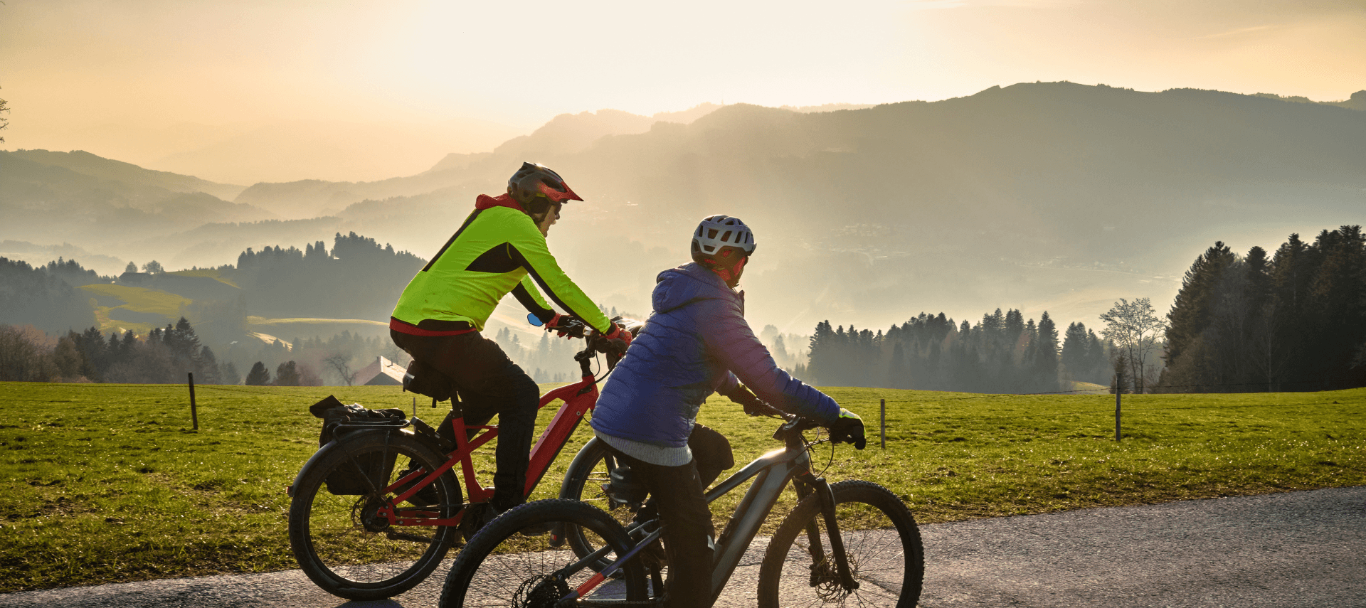 Two people biking